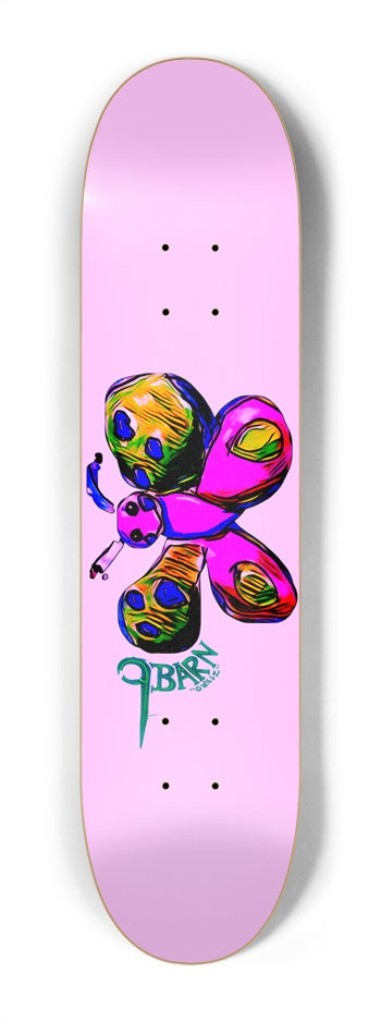 9BARN skateboard: pale pink mini deck with a magenta, yellow and green butterfly and 9BARN in teal script