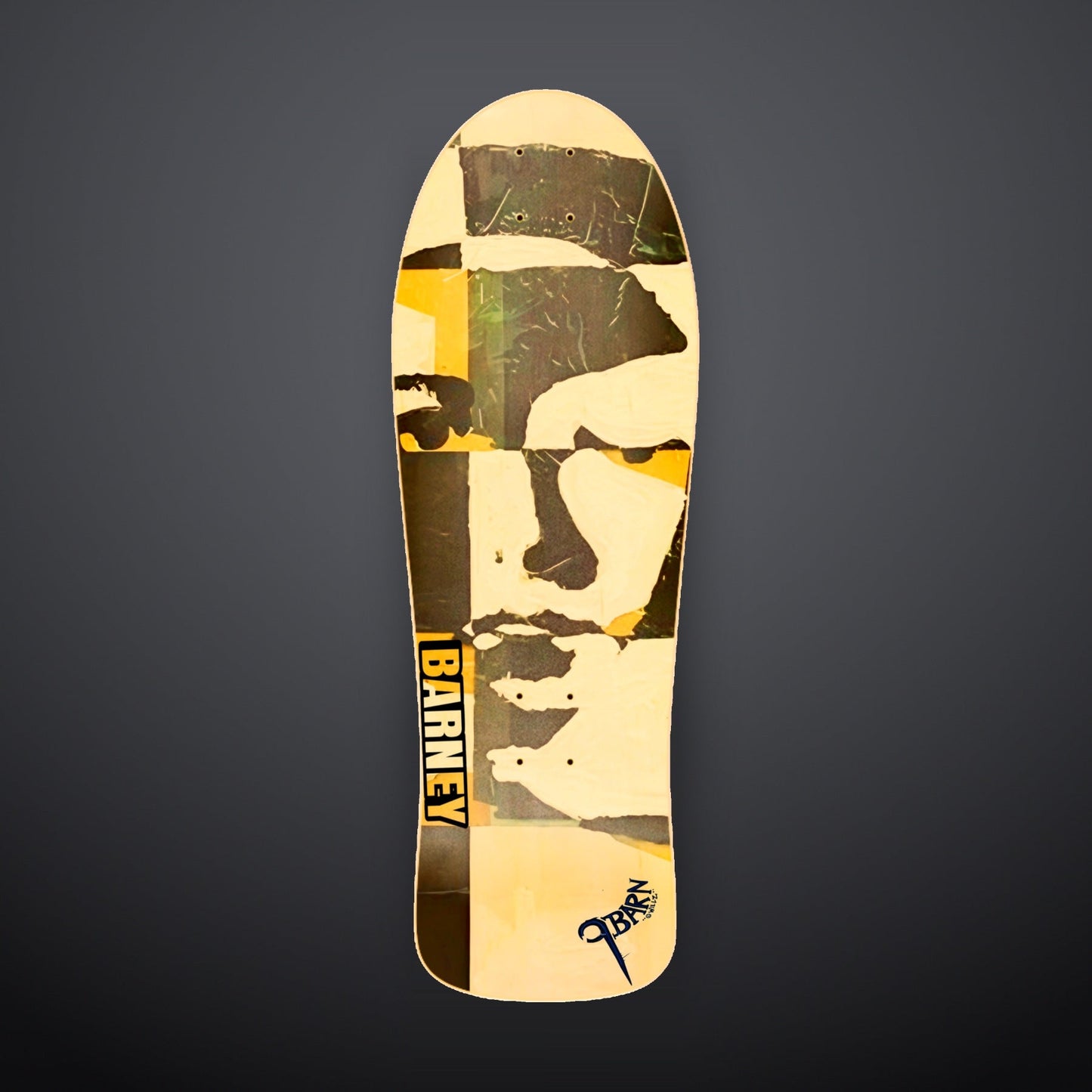 9BARN skate deck, Faces. Fragmented face in cream, olive and yellow, BARNEY down the rail, 9BARN hand-lettered by Willz at the tail.