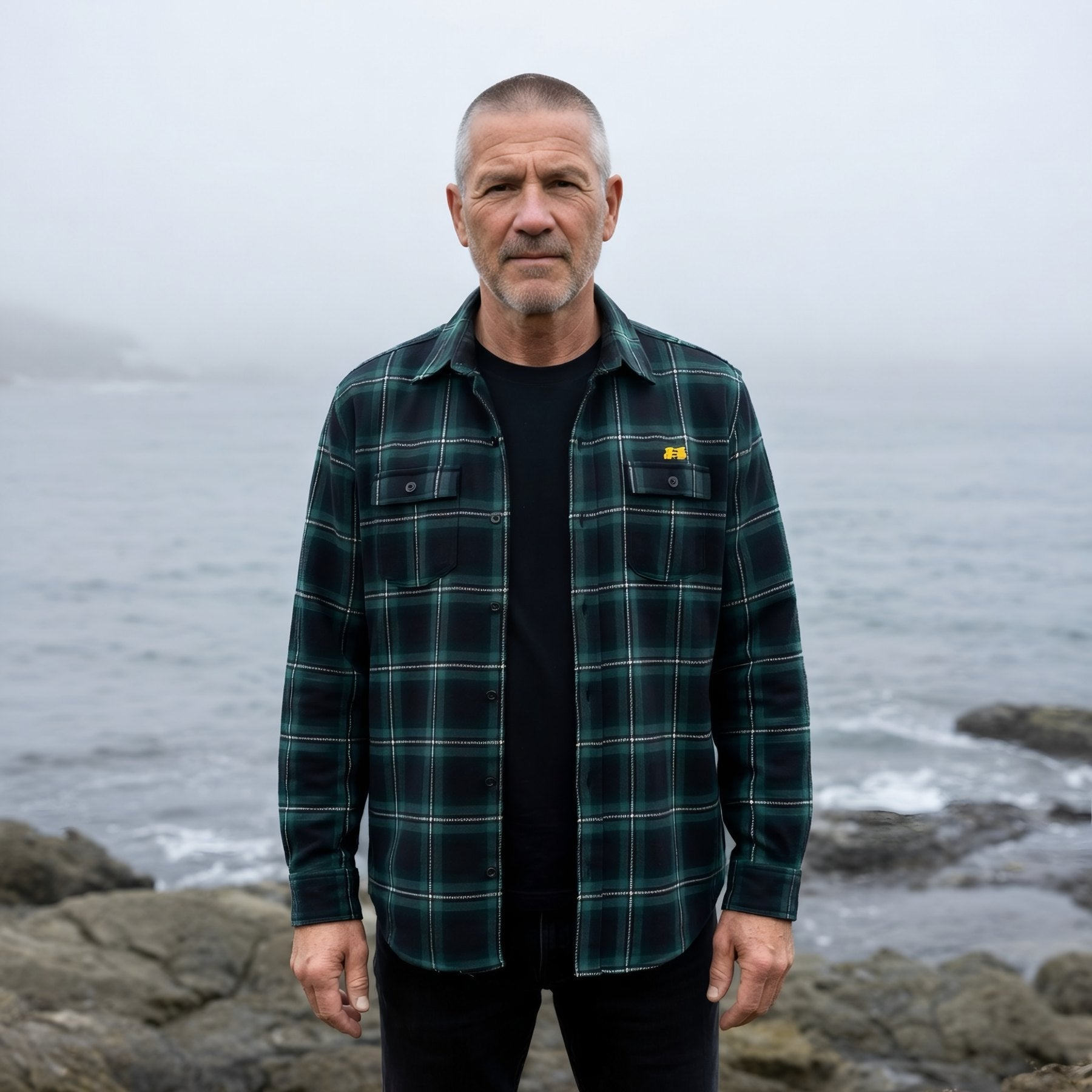 9BARN flannel work shirt, worn open over a tee.