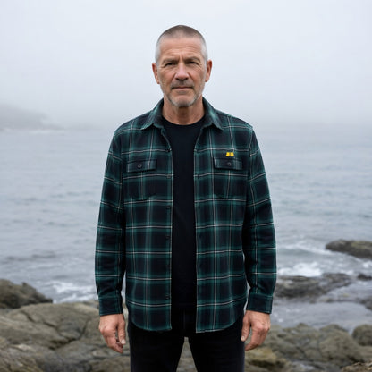 9BARN flannel work shirt, worn open over a tee.