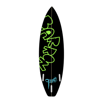 9BARN surfboard, Crossbones, bottom. Black bottom with BARRON in green outline running the length of the board, three fin boxes, and the 9BARN mark hand-lettered by Willz above the tail.