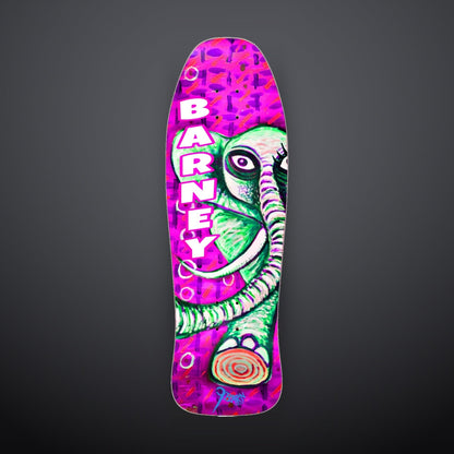 9BARN skate deck, Elephante. Green elephant over magenta by Shawn "Barney" Barron, BARNEY down the deck, 9BARN hand-lettered by Willz at the tail.